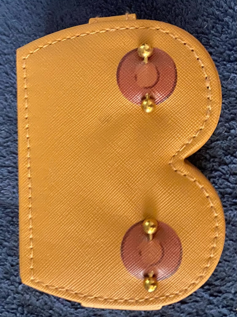 Tan Pierced Half Heart-Shaped Leather Jewelry Holder